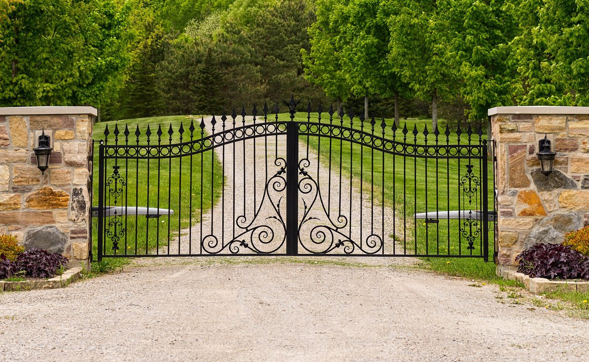 Wide Wrought-Iron Gate Between Two Columns