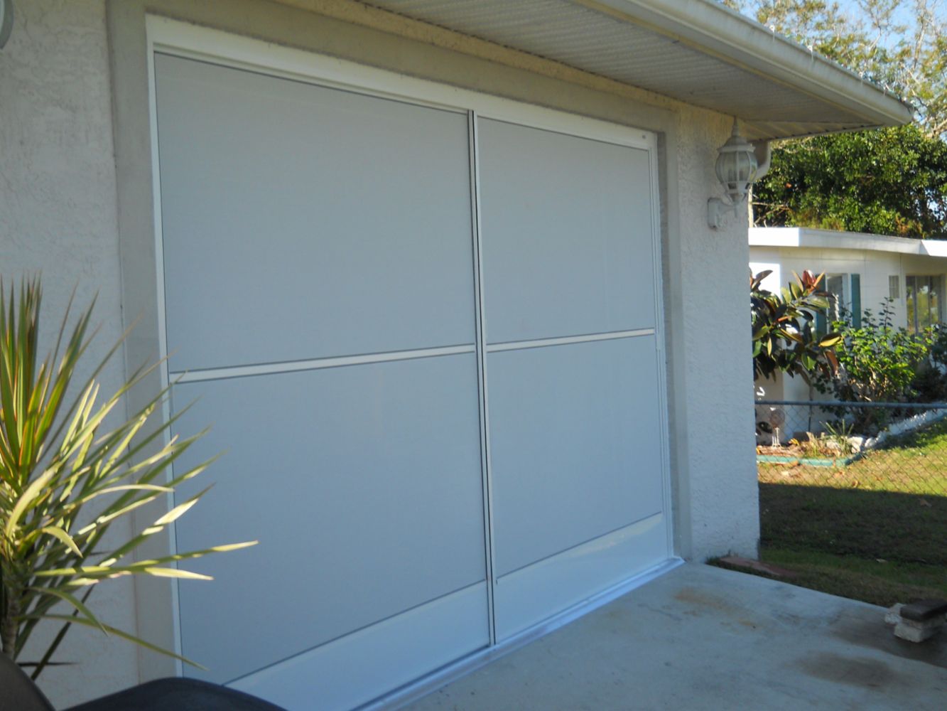 Garage Sliding Screens/ Vinyl Window Reroll in Port Charlotte, FL ...